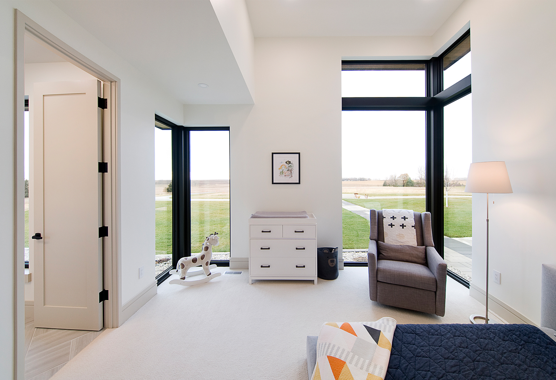 kids room with floor to ceiling windows
